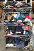 A large quantity of assorted new and pre-owned clothing. (across four baskets).