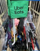 A quantity of assorted umbrellas, walking sticks and artwork to include Tonic, Wimbledon and related