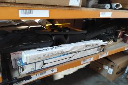 A quantity of miscellaneous musical instruments, accessories and related on one shelf.