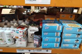 A shelf of assorted in-date food and confectionery products and related.