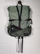 Four as new Sandqvist Kasper lightweight backpacks in dusty green/night green.