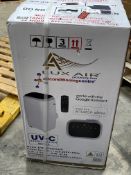 An as new Luxair portable air conditioner (Model KYR-25CO).