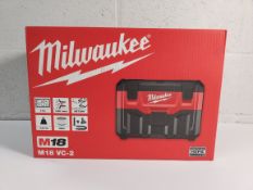 An as new Milwaukee M18 wet/dry vacuum, 7.5 litre (REF: M18 VC-2).
