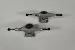 A pair of Tensor Mag Light Skateboard Trucks, 5.0, silver (0805538423488).