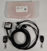 An ASR flap control RX1 for racing/export only to fit certain Range Rovers models, with two fobs (RX