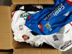 Approximately 50 assorted pre-owned sports shirts, mainly football.