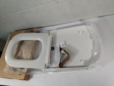 Six as new Grohe Euro ceramic soft-close toilet seats, Alpine white (39330001).