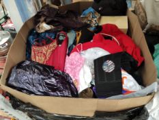 A pallet of assorted pre-owned clothing, shoes and clothing accessories.