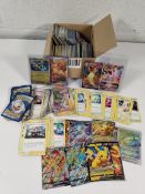 An assortment of Pokemon trading card game cards to include English and Japanese language cards.