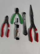 Five pre-owned Snap On tools.