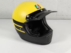 An as new AGV X101 ECE full face helmet, dust matt yellow/black (217701A2N0002010) (slight damage to