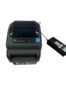 Pre-owned Zebra GX420d Direct Thermal USB/Serial Parallel Front Mounted Cutter Label Printer.