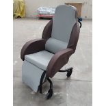 A pre-owned Drive Devilbiss Integra shell chair (50cm, 44cm, sold as seen).