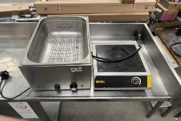 A Nisbets countertop bain marie and a Buffalo countertop induction hob.