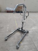 A pre-owned Invacare patient lift (REF: 300050502A00-0125, sold as seen).