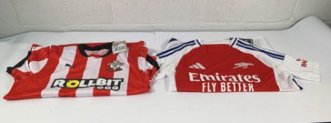 An as new Puma Southampton FC shirt size M and Adidas Arsenal FC shirt size M.