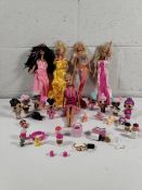 A quantity of vintage dolls to include Barbie and Bratz.