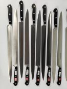Eleven Wusthof narrow slicer bolstered knives, 320mm (4520) (over 18s only) (tray not included).