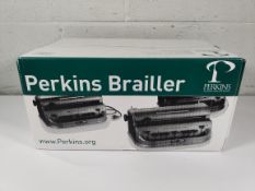 An as new Perkins Classic Standard Brailler in Blue (REF: BM36).