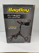 A BagBoy Nitron Push Cart, black and red (sold as seen).