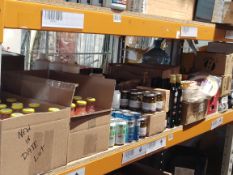A shelf of assorted in-date food and confectionery products and related.