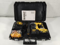 An as new DeWalt 18V XR Brushless SDS+ Rotary Hammer Drill with 2x 5.0Ah Batteries and Charger (DCH2