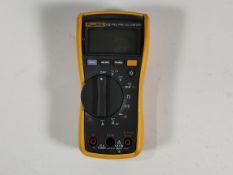 A pre-owned Fluke 115 True RMS Multimeter, 10A Fused, Cat III 600V.