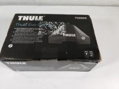 A boxed as new Thule Evo Clamp 710500 (contains 4 feet).