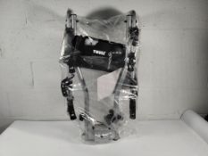 An as new Thule Hangon 4 bike hanging towbar bike rack, silver (970805).