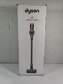 A pre-owned Dyson V8 Advance cordless vacuum.