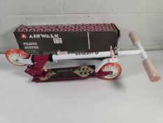 Eight Airwalk folding scooters in pink with LED wheels.