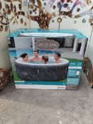 A boxed as new Lay-Z-Spa Boracay Smart Signature Airjet inflatable hot tub.