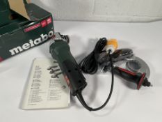 A Metabo WP 11-125 Quick 1100W 125mm Angle Grinder with paddle switch, 110V.