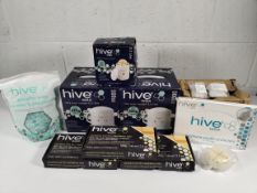 An assortment of Hive beauty related items to include 3 heaters and various waxes and mini spatulas