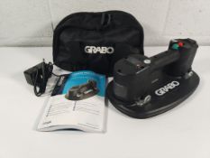 A pre-owned Grabo Pro Lifter 20 electronic suction device, battery and charger included.