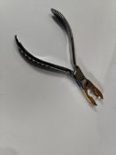 Fifty as new brass closing pliers.