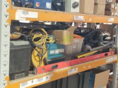 An assortment of hand and power tools to include Makita impact drills, Stabila level and Irwin clamp