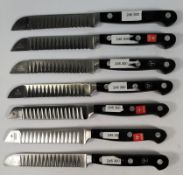 Seven Wusthof fluted decorating bolstered knives 110mm (4200) (over 18s only).