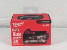 An as new Milwaukee M18B5 5Ah battery pack (4002395381449).