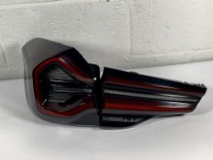 A BMW IX3 complete left tail light (G01 LCI).