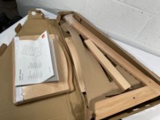 A Stokke Tripp Trapp Highchair, natural.