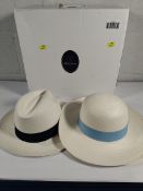 A women's Herbert Johnson Brisa Panama hat 57 and gentleman's Herbert Johnson Panama hat 59.