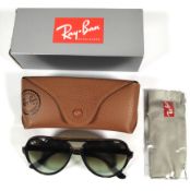An as new pair of Ray Ban Cats 5000 Light Havana frame with green gradient brown lens sunglasses wit