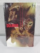DCeased Omnibus by Tom Taylor (hardcover). Good condition but some cosmetic damage to the seal, hard