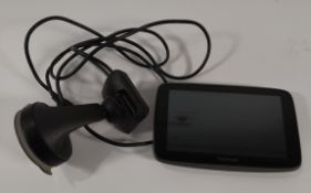 A pre-owned TomTom Go5200 with charger, cradle window mount.