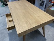 A solid wood table with some damage to the drawer, L 160, W 80 and H 76cm (sold as seen).
