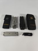 Four pre-owned multitools to include Leatherman Surge, Gerber Dime, Leatherman Side Clip, Leatherman