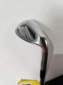 An as new Mizuno JPX 925 Hot Metal HL sand wedge golf club (Right-handed).