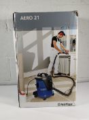 An as new Nilfisk Aero 21-01 wet and dry vacuum cleaner in blue/black.