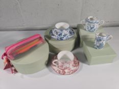 Five Harrods homewares to include Toile blue creamer, Toile blue sugar bowl, Pink teacup and saucer,